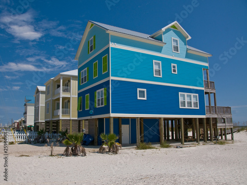 coastal blue beach house on stilts