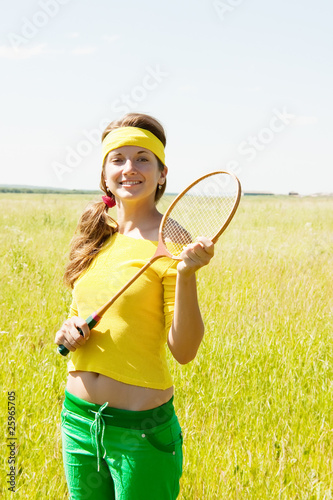 Portrait of teen  badminton player photo