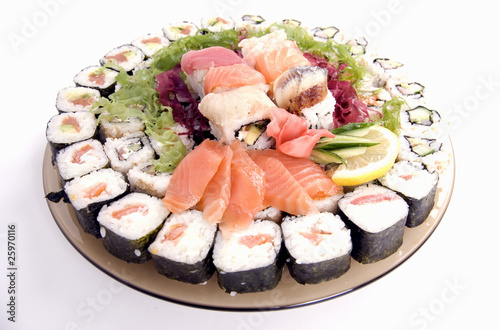 Composition of rolls, fish and vegetables