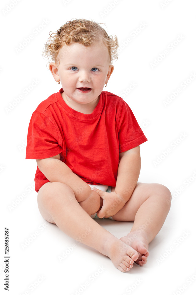 Baby girl sitting on floor isolated on white Baby girl sitting on floor isolated on white