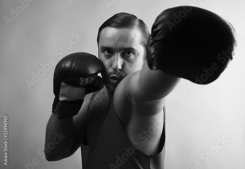 Vászonkép Portrait of boxer stylised under olden time