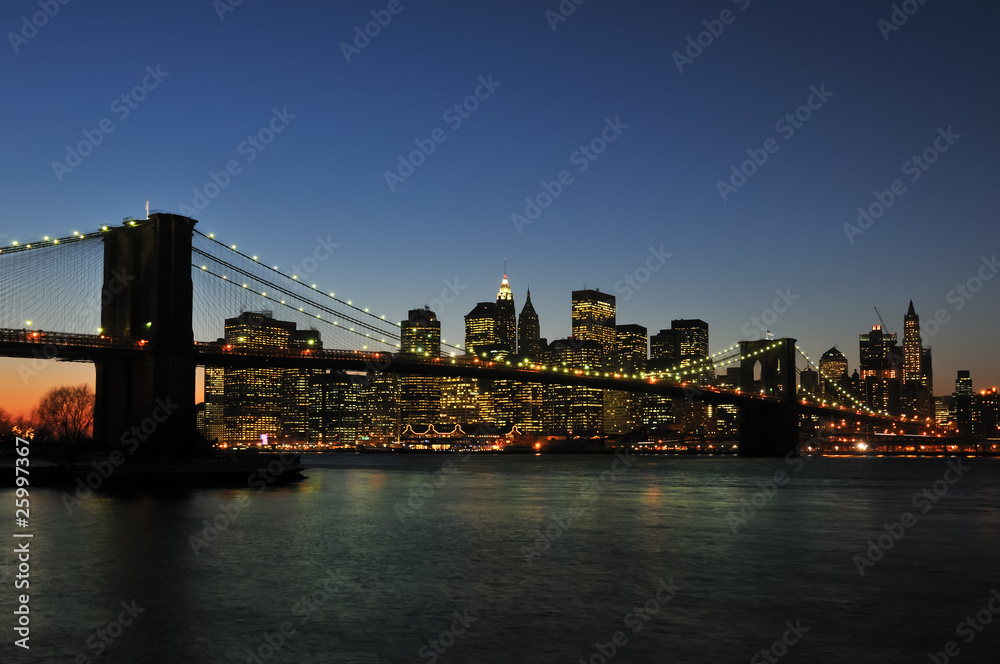 Brooklyn Bridge and Lower Manhattan at twilight.