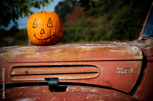 pumpkin on old ford pick up truck
