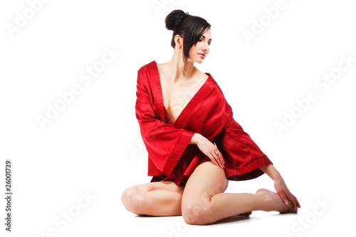 Sensuality young woman in red gown
