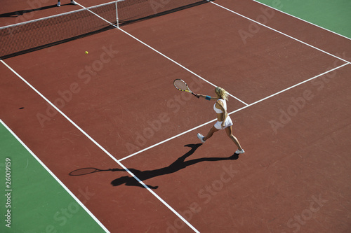 young woman play tennis © .shock