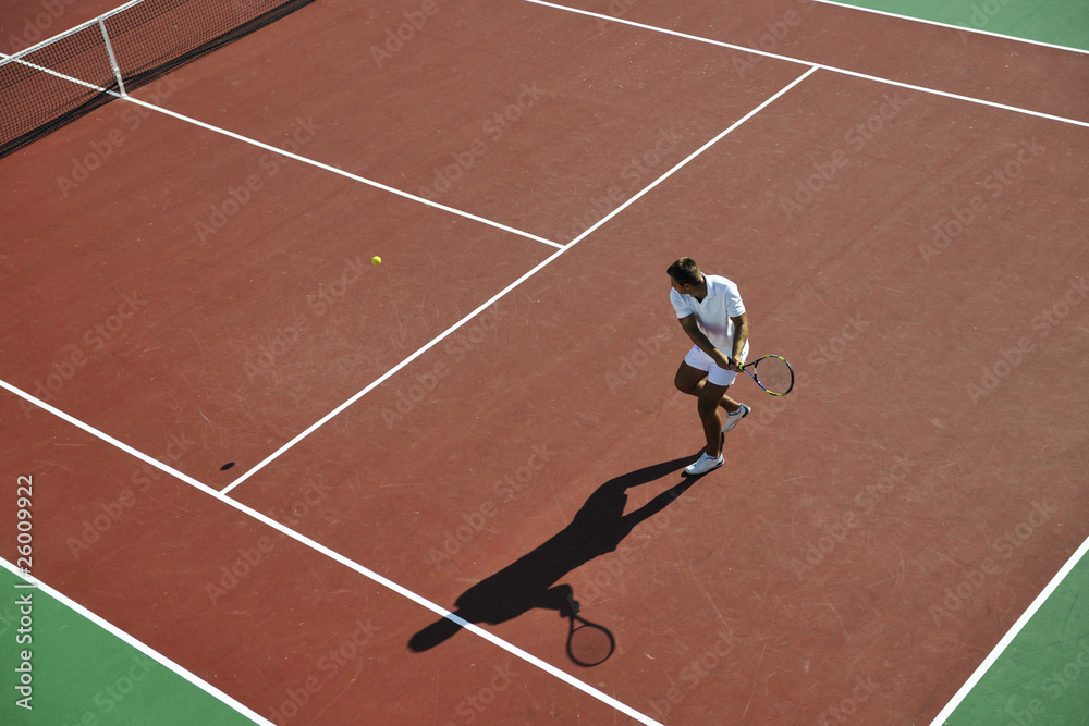 Fototapeta premium young man play tennis outdoor