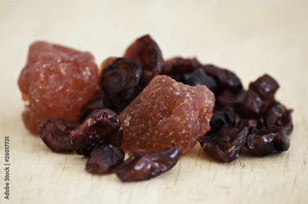 mix of Dried cranberries and strawberries close up mix of Dried cranberries and strawberries close up