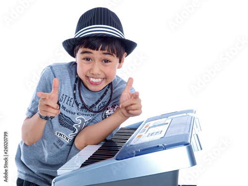 happy child pointing in front isolated on white background