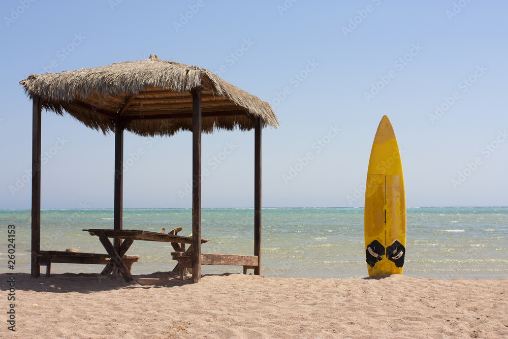 surfboard and beach hut