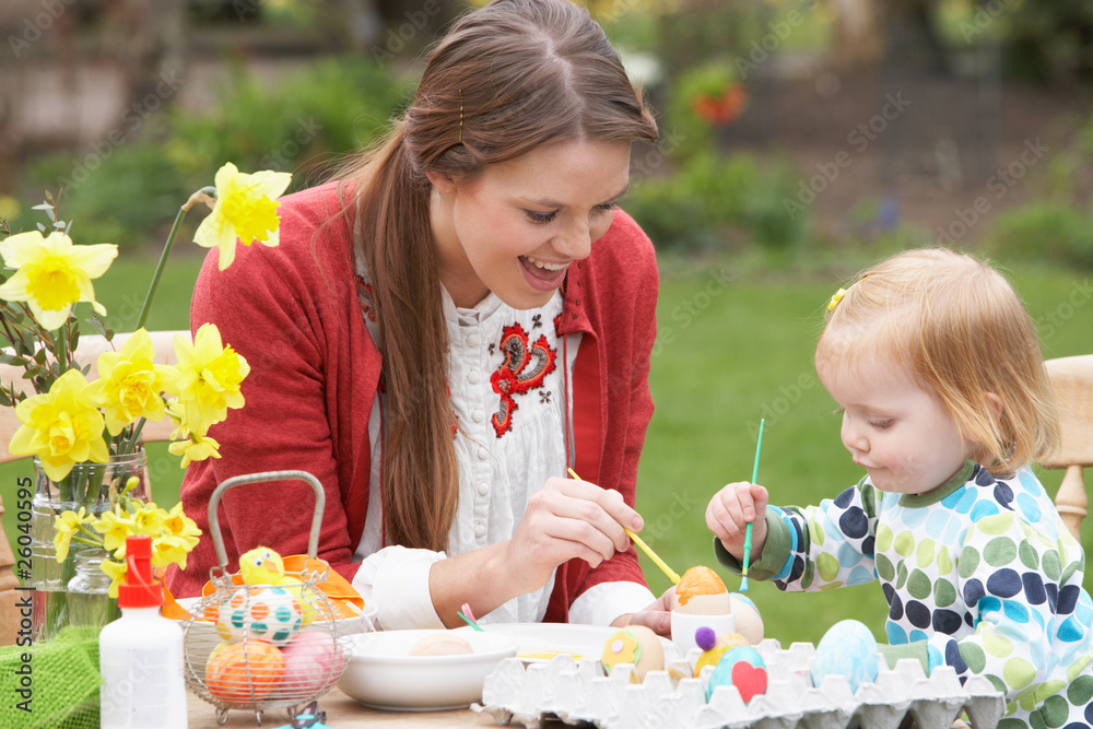 Mother And Daughter Painting Easter Eggs In Gardens Mother And Daughter Painting Easter Eggs In Gardens