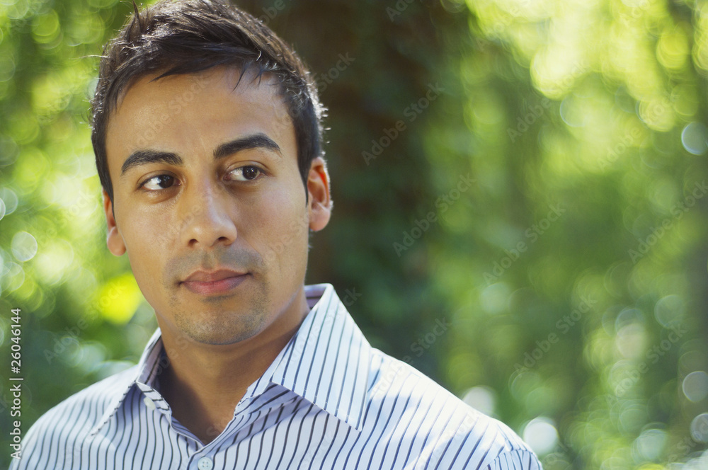 Hispanic man looking pensive