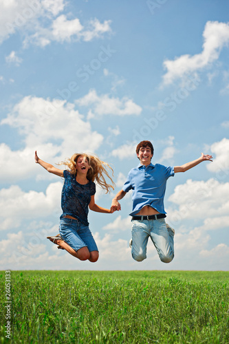 Happy couple jumping
