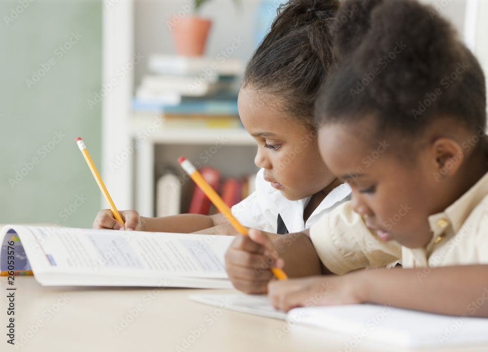 African girls doing homework African girls doing homework