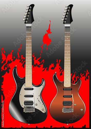 Two electric guitars placed on a flame background