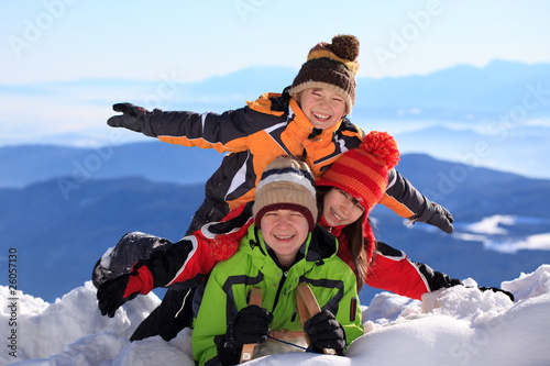 Children on snowy mountain