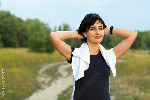 Sports woman resting outdoors