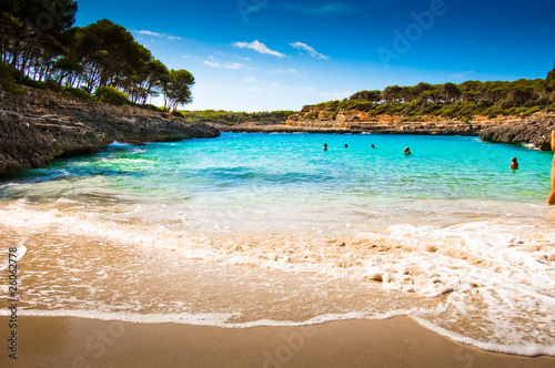 Beautiful view of Mediterranean beach with clear blue sky and se