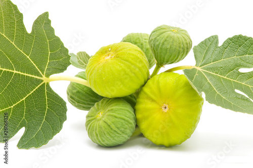 yellow figs with fig leaves