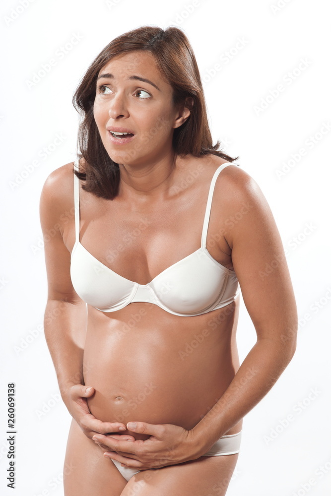 Obraz premium Pregnant woman cramps anxious pain contraction