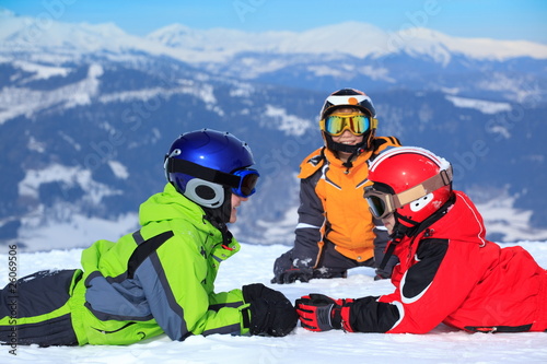 Children in snow on mountain