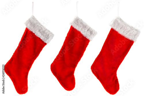 Three traditional red Christmas Stocking