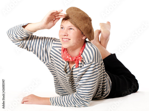 Teenage dressed in seaman shirt looking into the distance