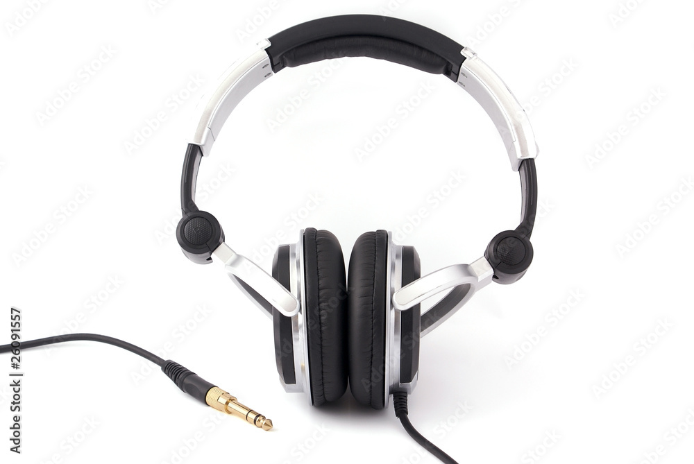 Headphones with gold plug on white background Headphones with gold plug on white background