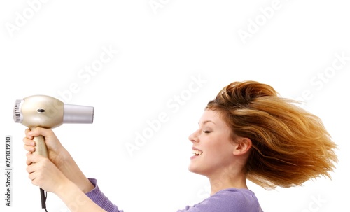young beauty with closed eyes and hair drier (white background)