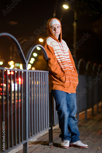 Young boy in the urbanic scene photo