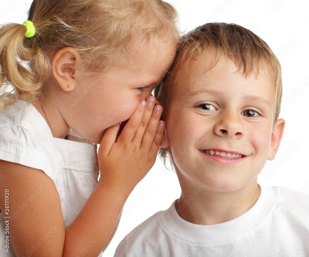 Girl whispers a secret Girl whispers a secret