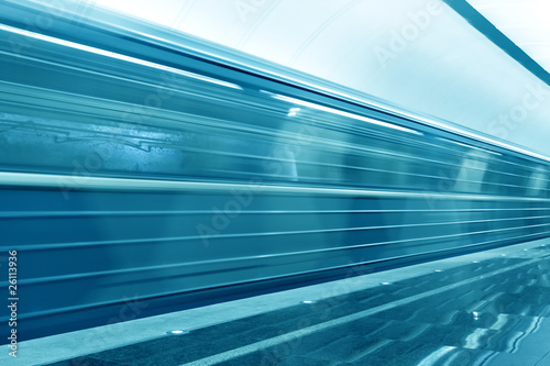 Moving train on underground station