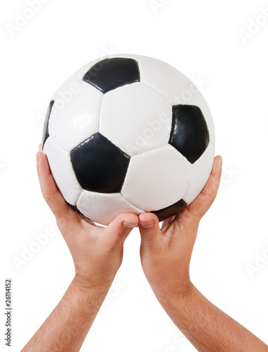 Hands holding football