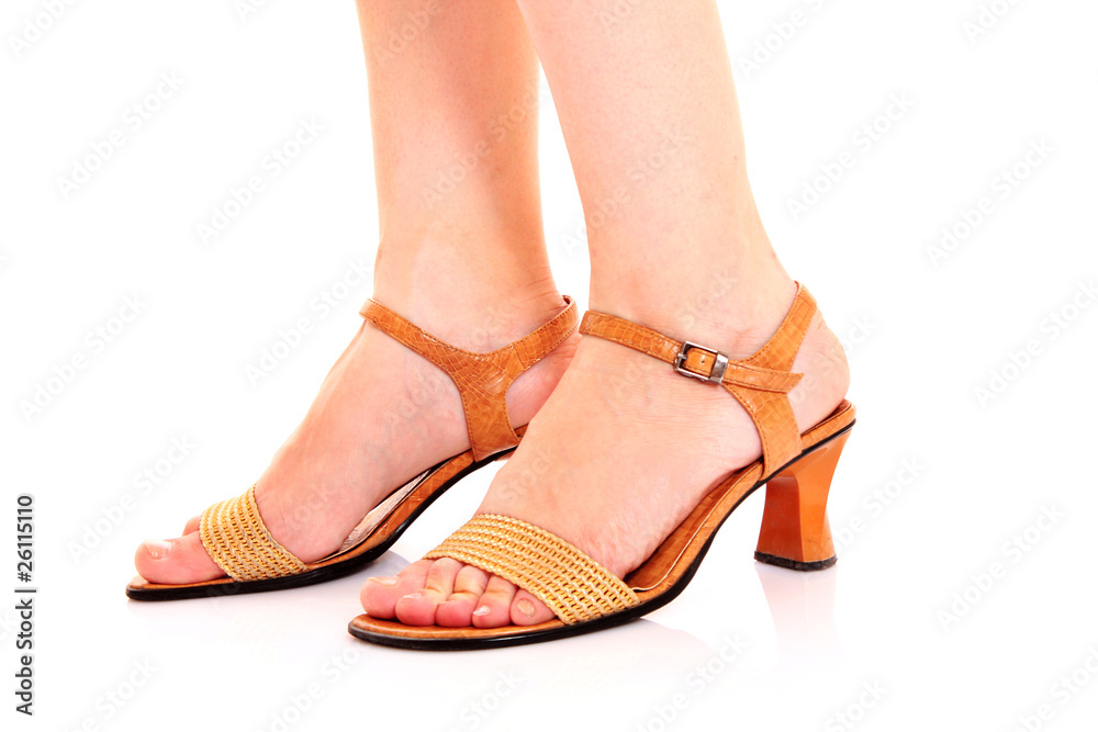 long woman legs in high heels isolated on white long woman legs in high heels isolated on white