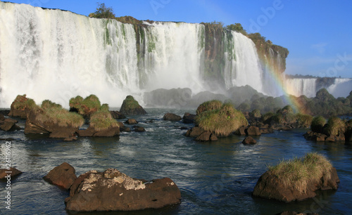 Igaucu falls with rainbow and rocks