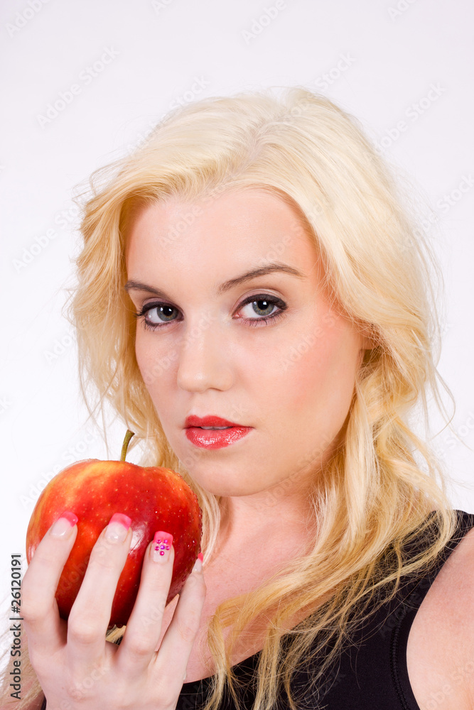 Blond woman with apple Blond woman with apple