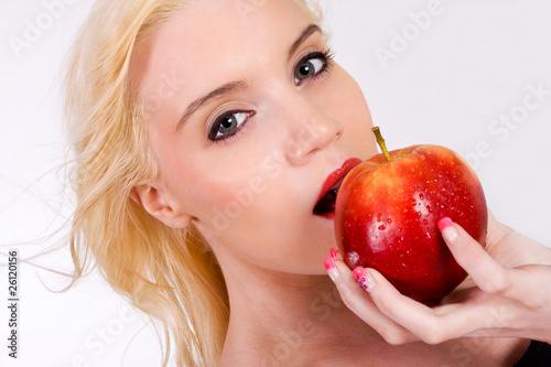 beautiful blond with apple