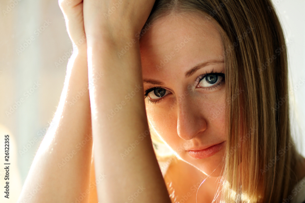 Naklejka premium Closeup portrait of a cute young woman