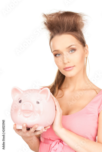 lovely woman with piggy bank