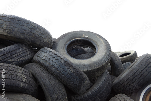 Pile of old tires on white background photo