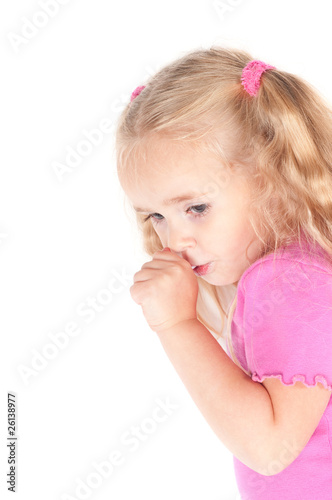 Little cute girl in studio eating candy