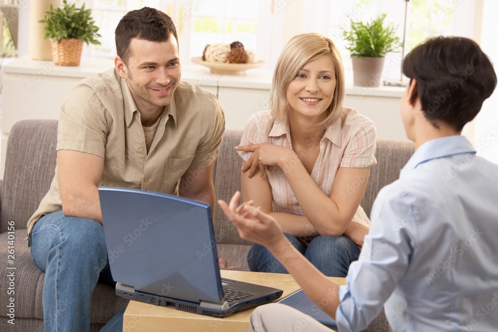 Advisor and couple in discussion Advisor and couple in discussion
