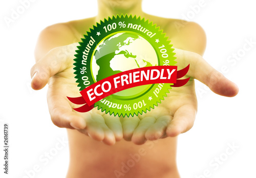 Hands holding eco friendly sign photo