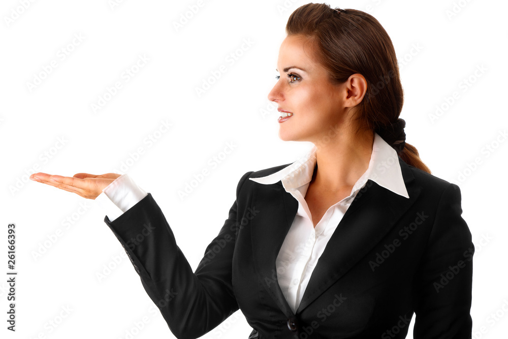 smiling modern business woman presenting something on empty hand smiling modern business woman presenting something on empty hand