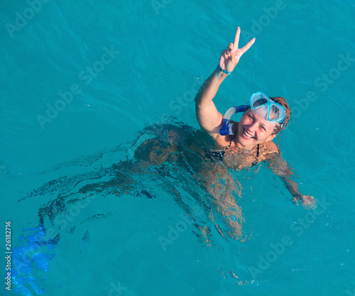 A woman wearing a mask for diving