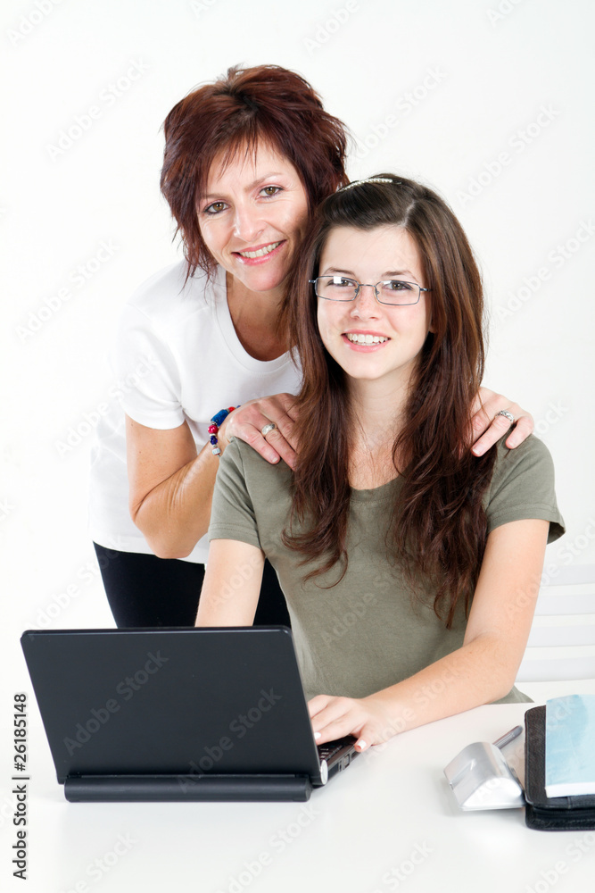 smart mom and daughter using laptop smart mom and daughter using laptop