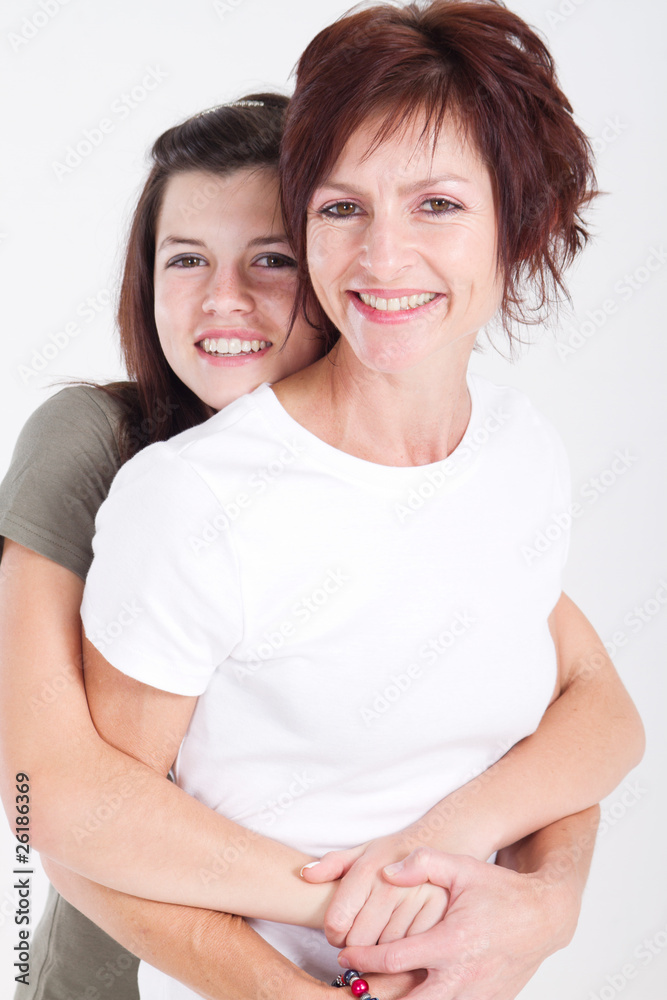 happy mother and daughter hugging happy mother and daughter hugging