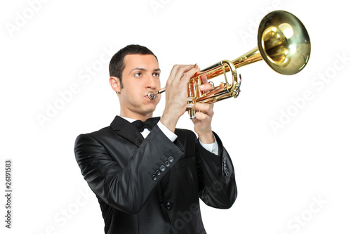 Young man in suit playing a trumpet