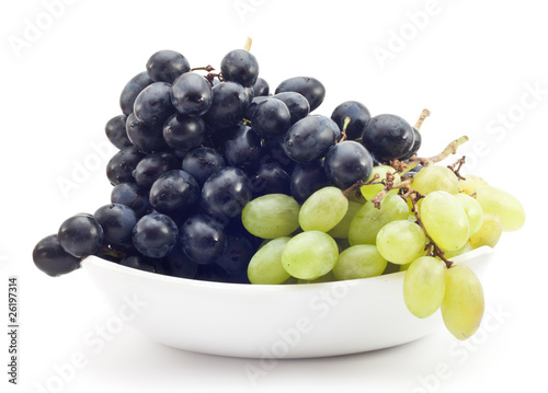 branch of green and black grapes