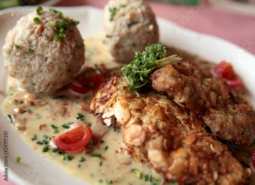 Kalbsschnitzel in Mandelkrustemit Rahmschwammerln, Semmelknödel photo