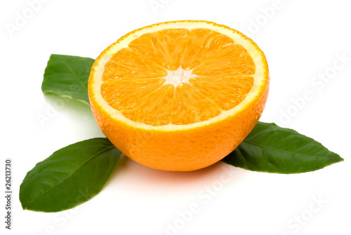 Sliced oranges with leaves on a white background